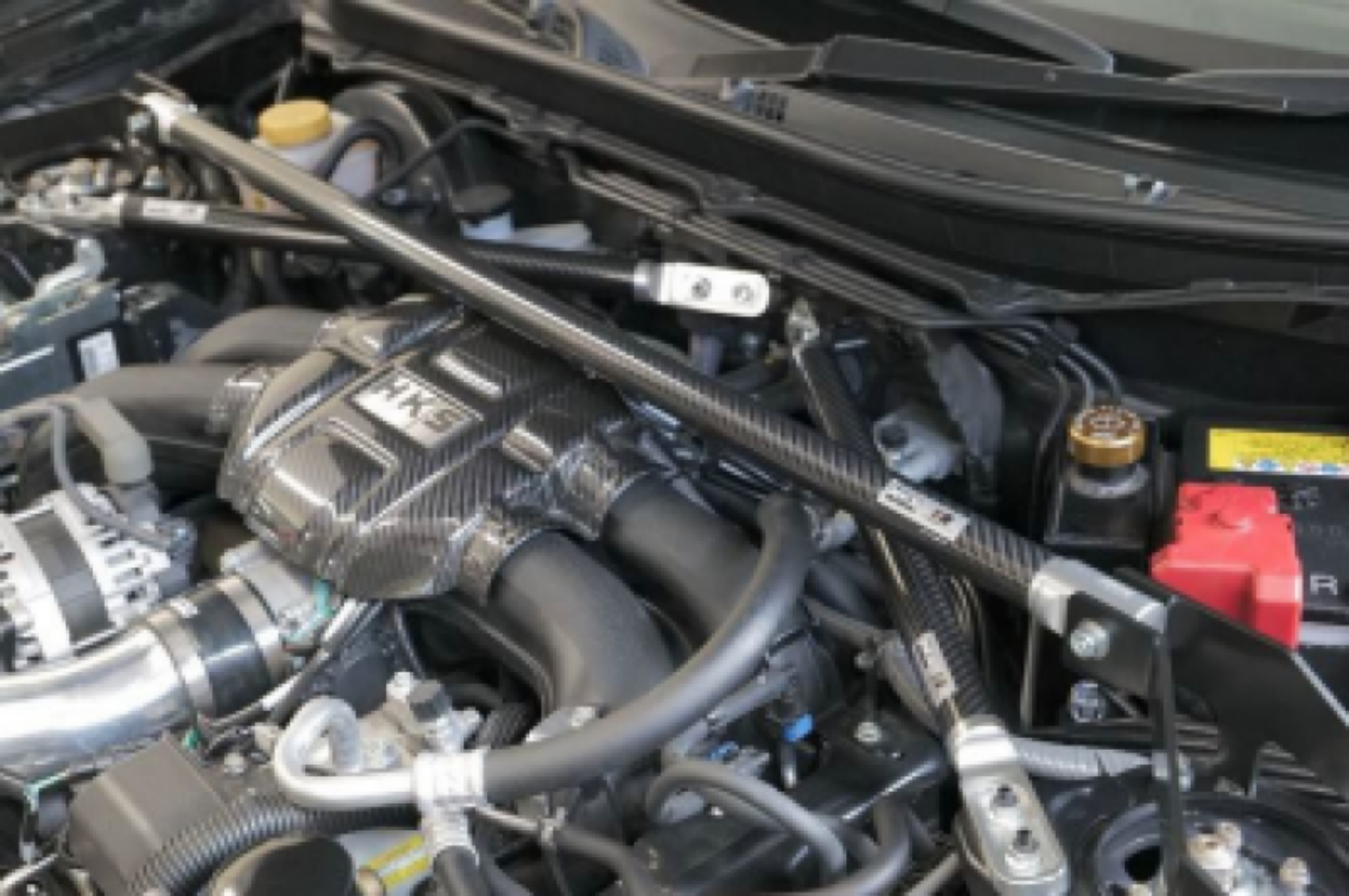 Picture of HKS CARBON BRACE ZN8/ZD8 FRONT SET