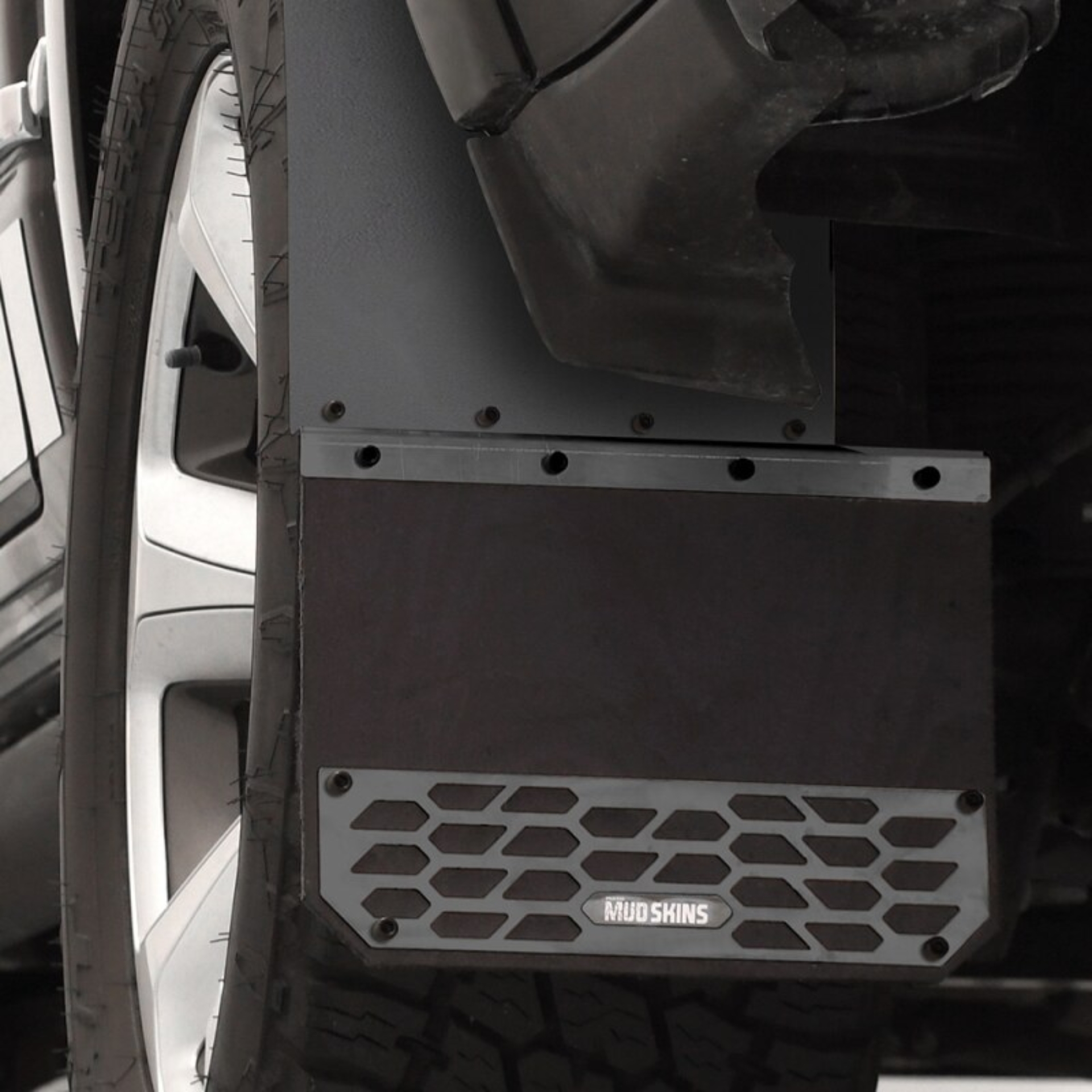 Picture of Putco 19-25 Chevrolet Silverado LD / GMC Sierra LD (Front) - Set of 2 Mud Skins - Solid Black