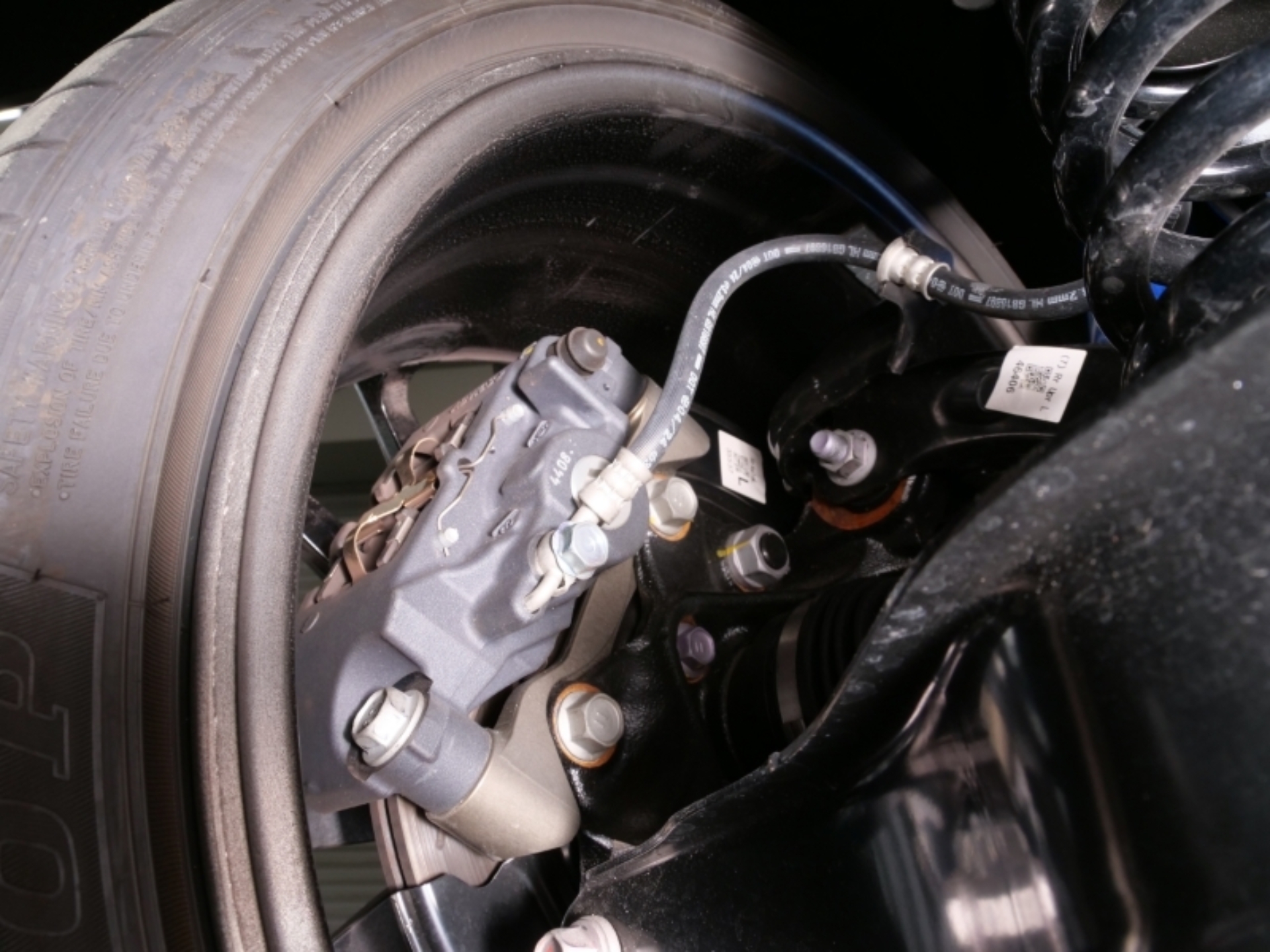 Picture of Cusco 23-25 Toyota GR Corolla Light Weight Rear Brake Caliper Bracket - Billet Aluminum