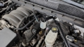 Picture of J&L 14-18 Chevy Silverado 1500 / 14-18 GMC Sierra 1500 4.3L V6 Oil Separator - Clear Anodized