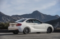 Picture of Dinan 14-16 BMW M235i (F22) w/o M-Performance Valence Free Flow Axleback Exhaust System - Black Tips