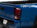 Picture of Raxiom 16-23 Toyota Tacoma XW Series Sequential LED Tail Lights- Black Housing- Red Lens