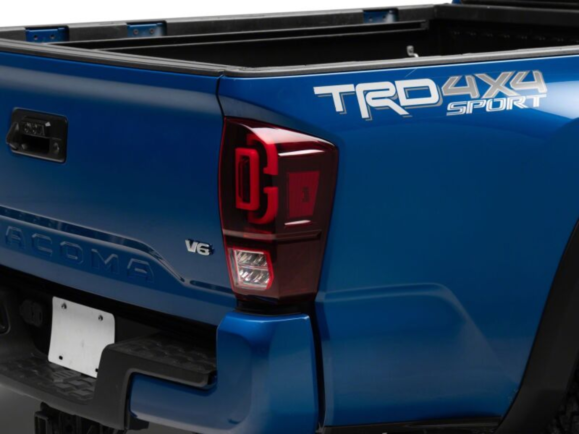 Picture of Raxiom 16-23 Toyota Tacoma XW Series Sequential LED Tail Lights- Black Housing- Red Lens