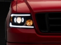 Picture of Raxiom 04-08 Ford F-150 Axial Series Projector Headlights with LED Bar- Black Housing- Clear Lens