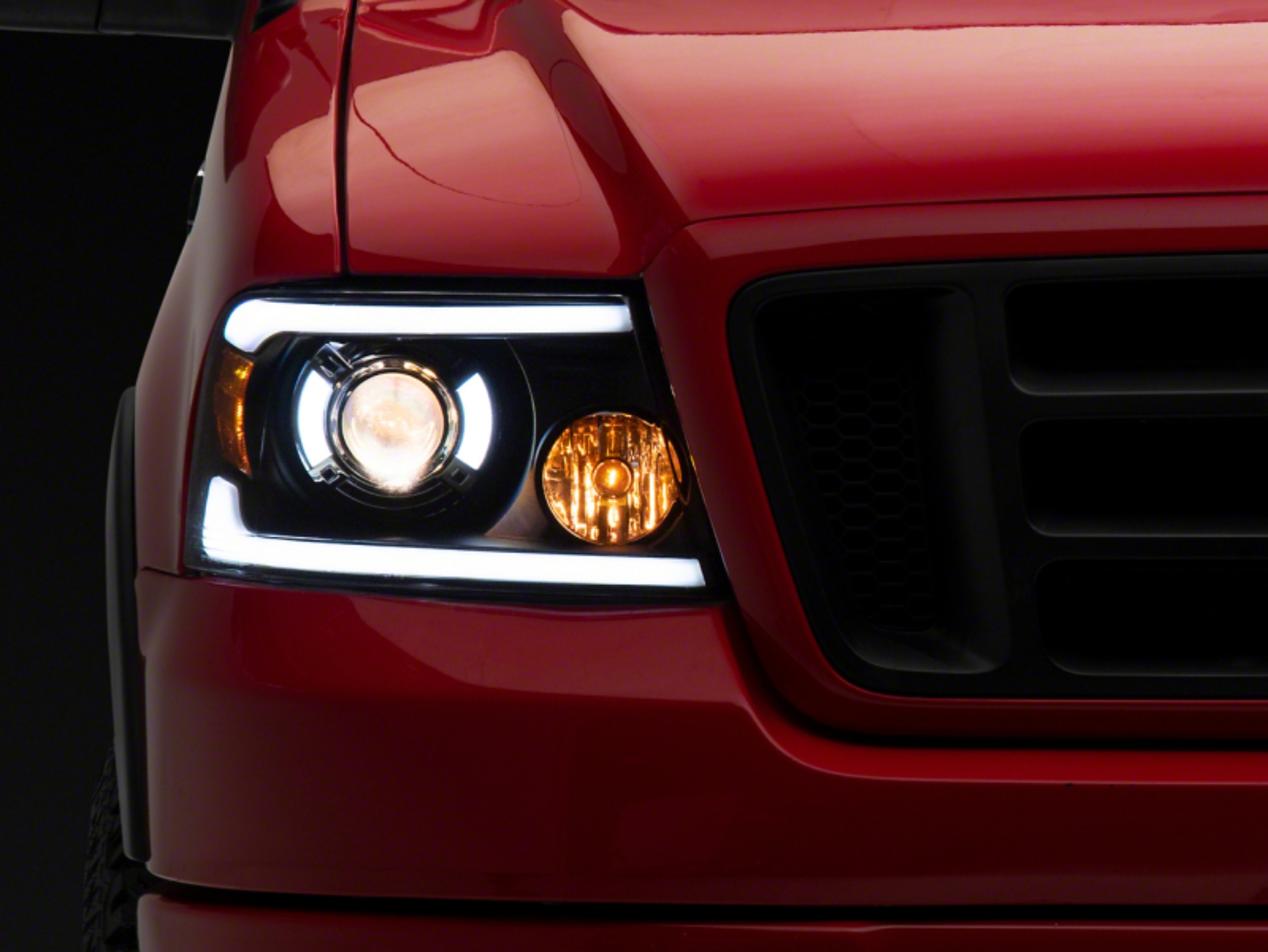 Picture of Raxiom 04-08 Ford F-150 Axial Series Projector Headlights with LED Bar- Black Housing- Clear Lens