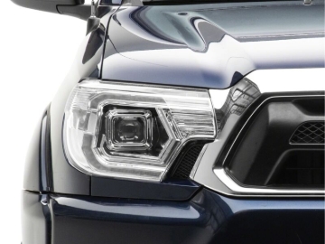 Picture of Raxiom 12-15 Toyota Tacoma Axial Series Switchback Projector Headlights- Chrome- Clear Lens