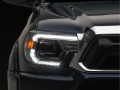 Picture of Raxiom 12-15 Toyota Tacoma Axial Series Switchback Projector Headlights- Chrome- Clear Lens