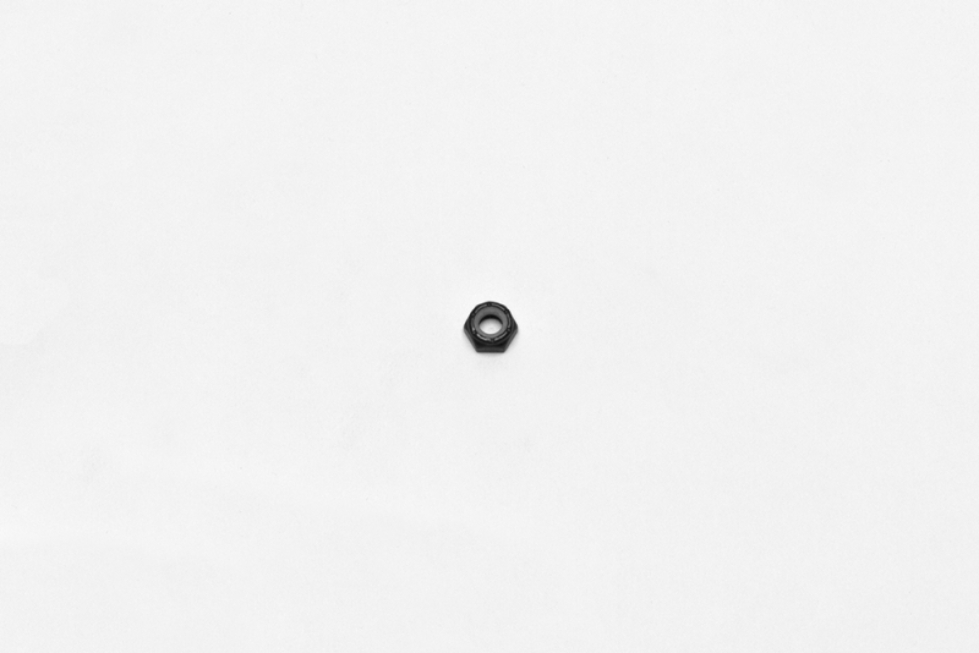 Picture of Wilwood nut 1/4-28 thin nylock 7/16 hex black zinc